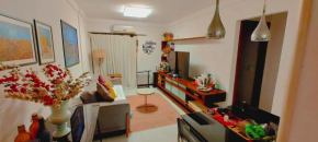 Quarto e banheiro privativos com garagem fechada em apartamento aconchegante em Jardim da Penha